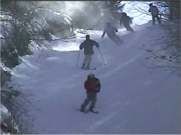 A posse of local skiers descends on Broomstick in this scene from the Magic Moments video.