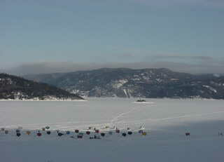 Ice fishing shanties dot the Saguenay Fjord. (photo: Marc Guido)