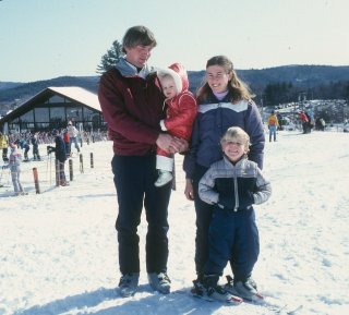 Tim and Diane Mueller on the slopes of Okemo with son Ethan and daughter Erica in 1982, the year that they purchased the central Vermont resort.
