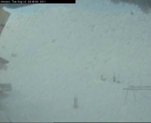 The web cam outside the day lodge at New Zealand's Broken River ski area shows blizzard condiions on Tuesday morning. (photo: Broken River)