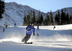 A skier enjoys her season's first run Thursday at Arapahoe Basin. (photo: Jack Dempsey) A skier enjoys her season's first run Thursday at Arapahoe Basin. (photo: Jack Dempsey)