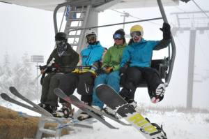 Happy skiers and riders brave fog and drizzle Tuesday at Cypress Mountain, the first ski resort in British Columbia to open this season. (photo: Cypress Mountain) Happy skiers and riders brave fog and drizzle Tuesday at Cypress Mountain, the first ski resort in British Columbia to open this season. (photo: Cypress Mountain)