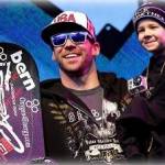Nick Baumgartner, of Iron River, Mich., with son Landon after winning 2011 Winter X Games SBX gold.