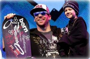 Nick Baumgartner, of Iron River, Mich., with son Landon after winning 2011 Winter X Games SBX gold. Nick Baumgartner, of Iron River, Mich., with son Landon after winning 2011 Winter X Games SBX gold.