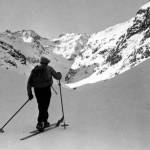 Hannes Schneider ski climbing in his native Arlberg region. Note the way his heel lifts off the ski to allow him to stride forward. (photo: Lothar Rübelt, courtesy of the Schneider Family) Hannes Schneider ski climbing in his native Arlberg region. Note the way his heel lifts off the ski to allow him to stride forward. (photo: Lothar Rübelt, courtesy of the Schneider Family)