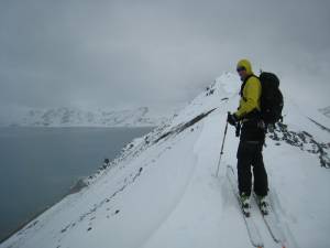 Lake Tahoe, Calif.-based guide C.J. Ware ascends the ridge line on King George Island, Antarctica (photo: FTO/Tony Crocker)