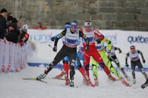 Kikkan Randall, of Anchorage, Alaska, skates to a FIS World Cup win with teammate Jessie Diggins in the first ever U.S. team sprint victory on Friday in Quebec. (photo: Reese Brown)