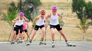 Kikkan Randall, Holly Brooks and Sadie Bjornsen head up a hill during an APU Nordic roller ski camp outside Heber City, Utah, in August. (photo: Tom Kelly)