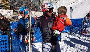 Bode Miller stands with his son after forerunning the Birds of Prey downhill on Wednesday. (photo: USST)