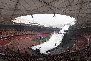 Snow-covered scaffolding soars high towards the top of the Bird's Nest Stadium in Beijing, China. (photo: FIS)