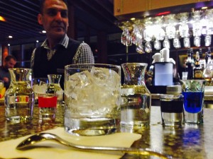 A bartender demonstrates a popular drink at the Casino de Mont-Tremblant, made with gin, 7-Up and curacao. (photo: FTO/Alan Wechsler)