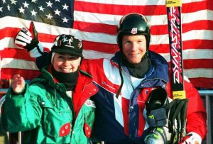 Tommy Moe stands with Hillary Clinton in the finish area of the Olympic men's downhill in Kvitjell, Norway, in 1994. (file photo: Getty Images-Jean Loup Gautreau via USST)