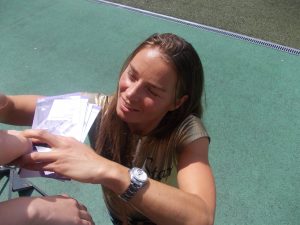 Ski racer Tina Maze signs autographs for fans at Stadion Ljudski vrt in Maribor, Slovenia, in 2015. (file photo: Janezdrilc)