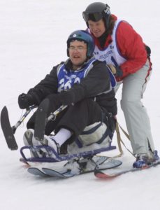 A veteran uses a bi-ski at the National Disabled Veterans Winter Sports Clinic in Snowmass, Colo. (file photo: Spc. Lorie Jewell)