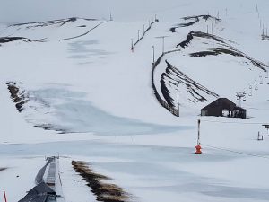A destroyed conveyor lift sits beneath rain-soaked slopes on Thursday at Bláfjöll Ski Resort in Iceland. (photo: Facebook/Einar Bjarnason)