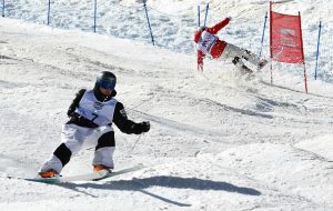 Ikuma Horishima of Japan (top) crashes during the finals against Montana's Bradley Wilson, who also blew out of the course. (photo: Getty Images-David Ramos via USSA)