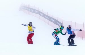 Sunday's women's big final in foggy La Molina, Spain, with Michela Moioli of Italy in green, Eva Samkovaof the Czech Republic in blue, France's Chloe Trespeuch in yellow. (photo: Mario Sobrino)