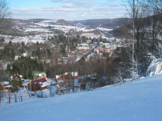 The slopes of HoliMont look down upon the center of Ellicottville.