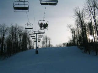 The Cascade quad chair serves expert terrain at HoliMont's eastern end.