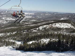 A fixed grip quad chair accesses Mont-Édouard's summit. (photo: Marc Guido)