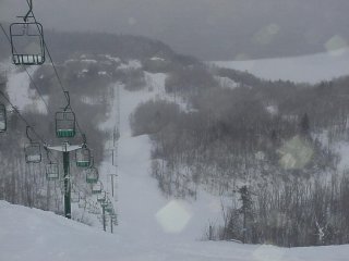 A partially-frozen Lac Memphremagog forms the backdrop for "The Wall" on the Colorado trail (photo Marc Guido)