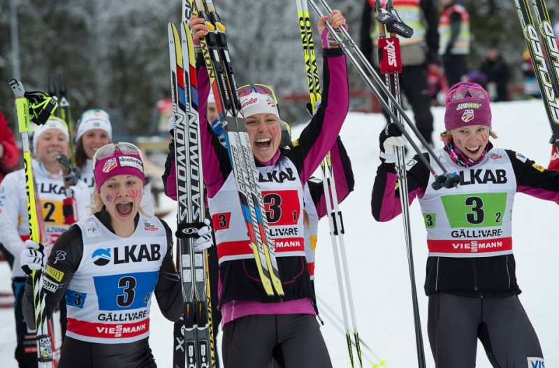 The U.S. Ski Team's Holly Brooks, Kikkan Randall, Liz Stephen and Jessie Diggins celebrate making history at 4x5k relay podium in Gaellivare, Sweden on Sunday (photo: Getty Images/AFP/courtesy USST)