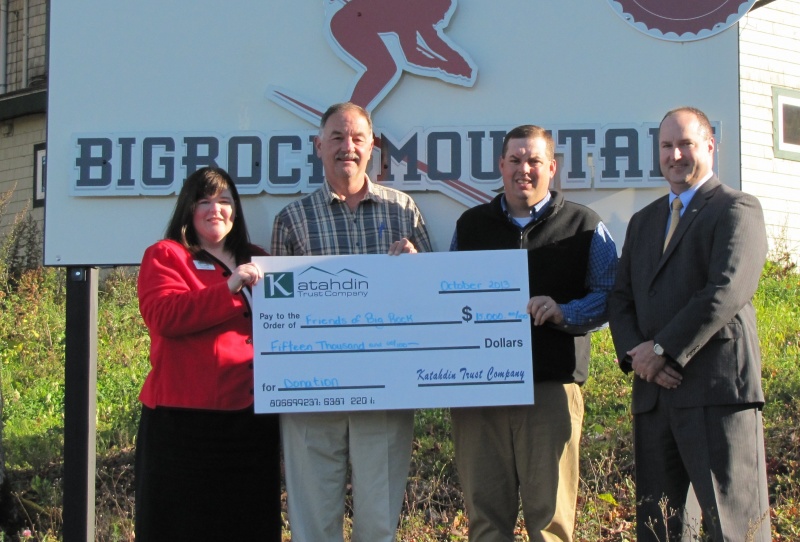 Katahdin Trust Company recently donated $15,000 to the Save Bigrock fundraising effort. Joining in the check presentation were (left to right) Tori Barber, Mars Hill Branch Manager and Retail Services Officer, Katahdin Trust Company; Bill Getman, General Manager of Bigrock Mountain; Ryan Guerrette, Operations Manager, Bigrock Mountain; and Jon Prescott, President and CEO of Katahdin Trust Company. (photo: Katahdin Trust)