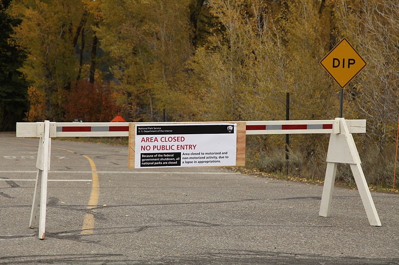 A barricade blocks entry to Grand Teton National Park in Wyoming. The park is closed due to the current federal government shutdown. (photo: Daniel Schwen)