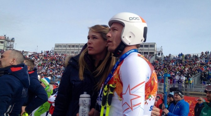 Bode Miller and wife Morgan Beck watch with disappointment from the finish line at Sunday's Men's Olympic Downhill in Rosa Khutor, Russia. (photo: Doug Haney/USST)