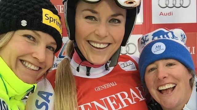 (L to R) Julia Mancuso, Lindsey Vonn and Stacey Cook celebrate the first-ever women’s World Cup podium sweep following Saturday’s downhill in Lake Louise (AB), Canada. (photo: U.S. Ski Team)