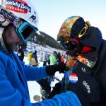 Dan Muehlfelt, left, pins the "I Skied Opening Day 2016" on his brother Frank from Chicago on the opening day of ski season at Arapahoe Basin Ski Area Friday, Oct. 21, 2016. (photo: Jack Dempsey)