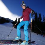 Anna Marie Migl, from Denver, steps into her bindings before taking a run on opening day of ski season at Arapahoe Basin Ski Area Friday, Oct. 21, 2016 (photo: Jack Dempsey)