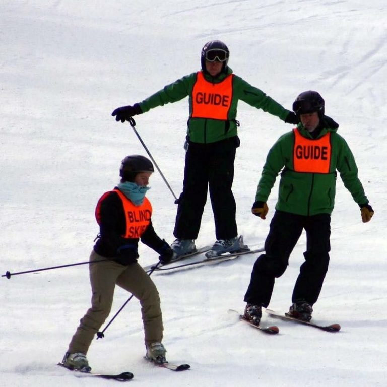 Visually Impaired Skiers Descend Upon Pico Mountain First Tracks