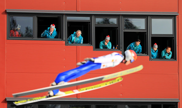 Judges watch a Nordic Combined athlete take part in Ski Jump training ahead of the FIS Nordic World Ski Championships in Lahti, Finland. (photo: Getty Images/Richard Heathcote via USSA)