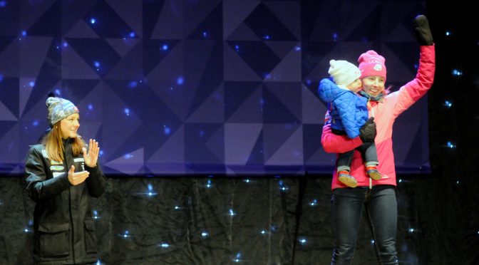 Kikkan Randall and baby Breck celebrate World Championships medal. (photo: Tom Kelly)