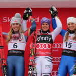 U.S.A.’s Mikaela Shiffrin (second place), Germany’s Viktoria Rebensburg (first place) and Italy’s Manuela Moelgg (third place)on the podium after the women’s Audi FIS Ski World Cup giant slalom race at Killington in Vermont on Saturday, November 25, 2017. (FTO photo: Martin Griff)